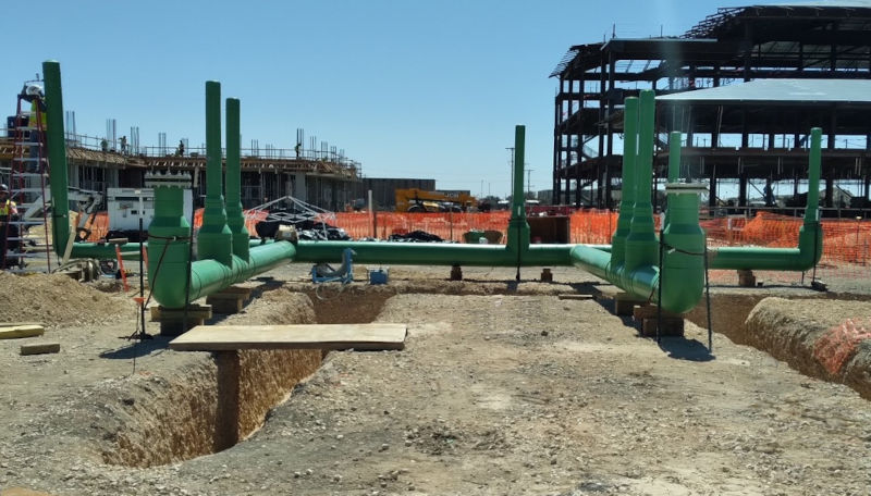 The Air Force’s new basic training facility required large diameter pipe and fittings to move 155ºF (68ºC) water effectively throughout the campus at 90 psi. Using PP-RCT pipe also enabled sections of the system to be fabricated and lifted into the trench. Courtesy: Asahi/America