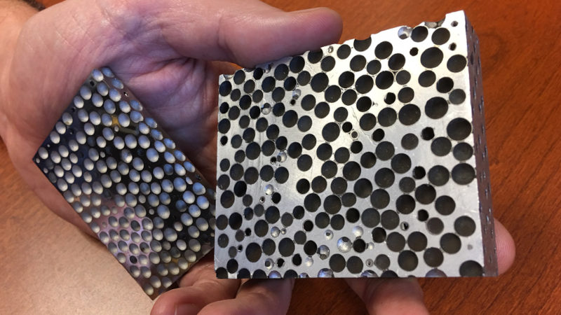 Composite metal foam (CMF) consists of metallic bubbles filled with air.