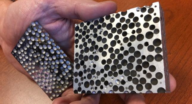 Composite metal foam (CMF) consists of metallic bubbles filled with air.