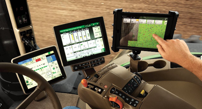 adjust and learn from their machinery while moving through the field. Courtesy: John Deere/RIA