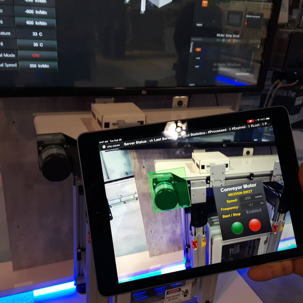 A tablet shows information speed, frequency and other information about a motor on a demonstration line at the Emerson Pack Expo Las Vegas 2021 booth. Courtesy: Mark T. Hoske, Control Engineering, CFE Media and Technology