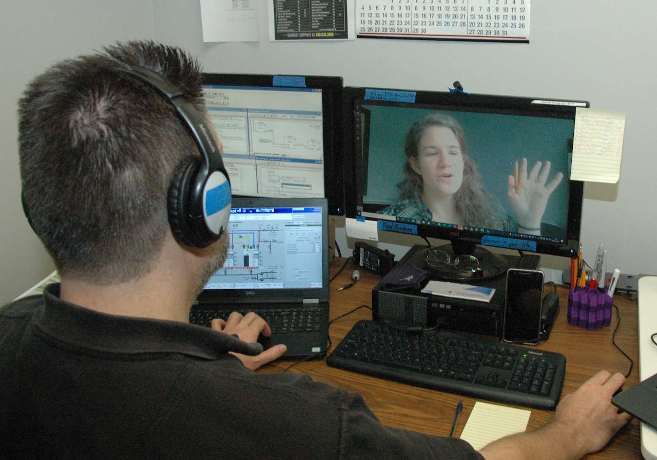 An engineer verbally directs a customer through troubleshooting a system. Courtesy: Applied Control Engineering Inc.