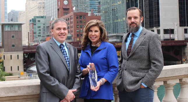 lead and director of engineering/IT; Nancy Lange (center)