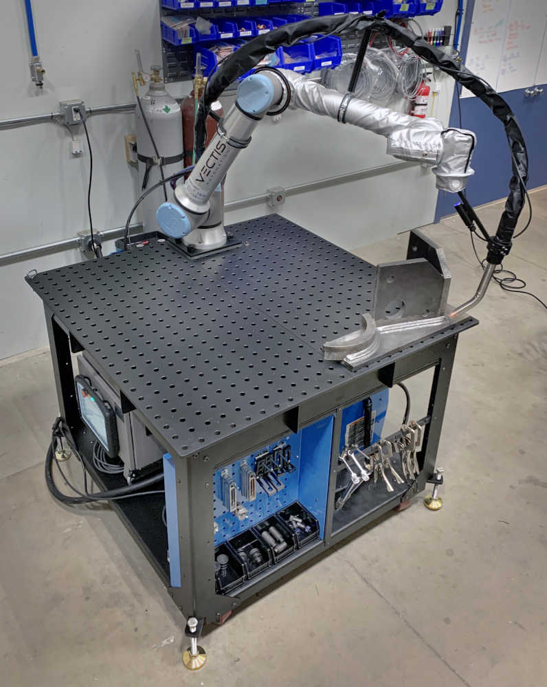 Figure 1: The Vectis Automation’s ArcPilot is a through-the-arc seam tracking feature in the Vectis Automation Cobot Welding Tool (a system powered by cobots from Universal Robots) to help manage variations. Through-the-arc seam tracking enables path correction during live welding by monitoring and using welding arc’s electrical characteristics to make cobot path adjustments in microseconds. The heavy-duty XL version of the Vectis Cobot Welding Tool can handle multi-pass welds and large wire diameters, common applications that can benefit from through-the-arc seam tracking. Courtesy: Vectis Automation