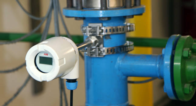 taking readings from the surface and then using software to predict the true medium temperature based on variables such as ambient conditions