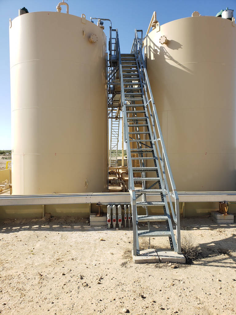 Figure 3: The PLCs that control pumping on these Occidental Petroleum storage towers require secure, reliable power. Courtesy: Bedrock Automation