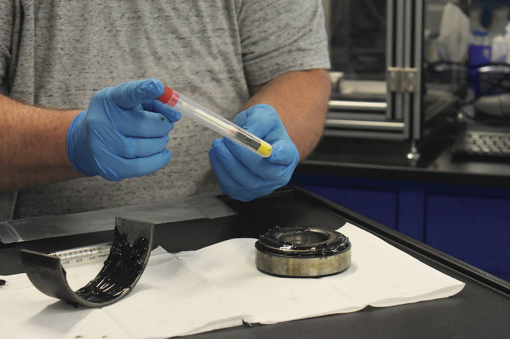 Top to bottom: Figure 4a. Taking a sample, step 1; Figure 4b. Taking a sample, step 2; Figure 4c. Taking a sample, step 3; Figure 4d. Taking a sample, step 4. Courtesy: POLARIS Laboratories.