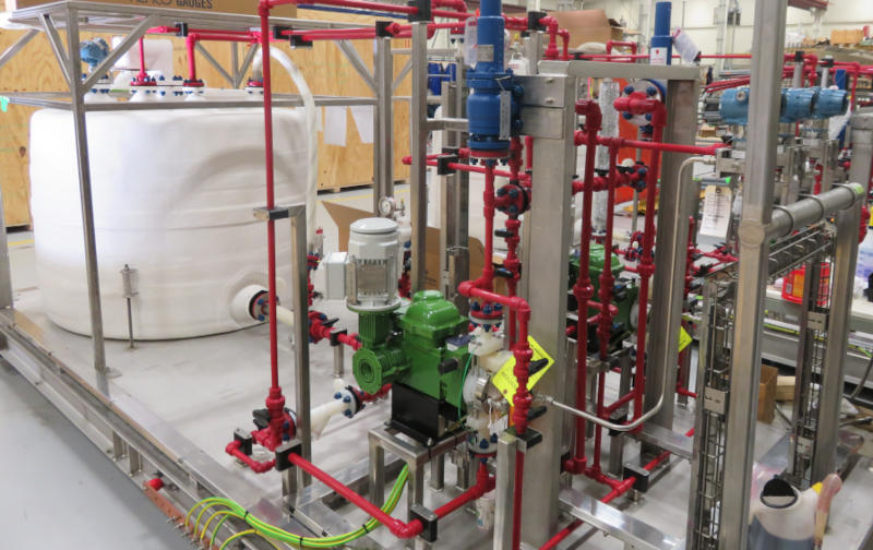 Figure 2: Example of Schedule 80 Red Kynar PVDF piping system designed to feed Sodium Hypochlorite. Courtesy: Plast-O-Matic Valves, Inc.