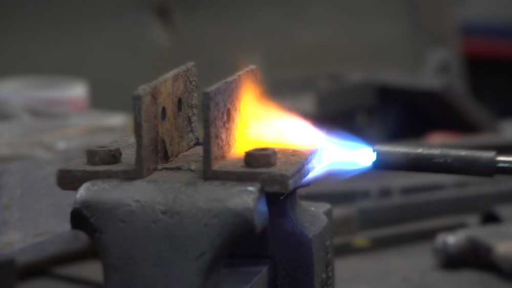 Figure 1: A common technique used when attempting to free a stuck part is to apply heat. The process involves many risks and requires great skill.