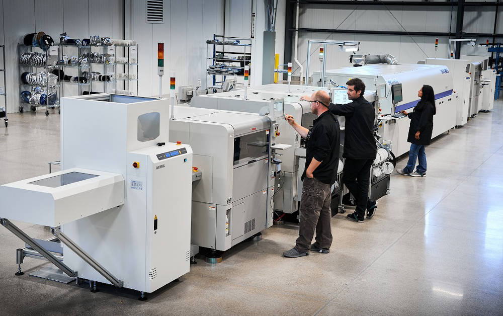 At the new facility, Smart Vision Lights employees work on the new surface mount technology (SMT) line, which allows the company to build electrical sub-assemblies. Courtesy: A3/Smart Vision Lights