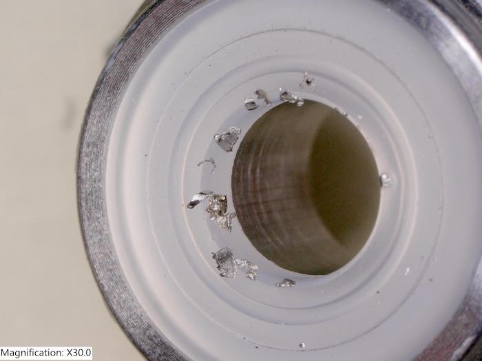 A particulate stuck in the regulator’s seat may allow pressure and flow to escape – or creep – across the regulator’s seat when it should otherwise be closed, resulting in an unwanted downstream pressure rise. Courtesy: Swagelok