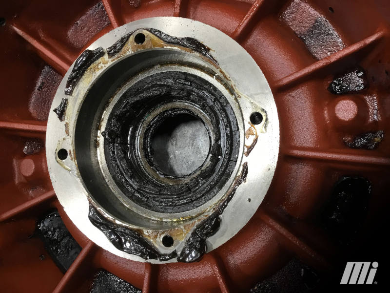 Overgreasing creates additional heat and failure of equipment, as shown here. This motor bearing and shaft are dripping with grease, while (right) one can see the grease-filled motor end bell housing.