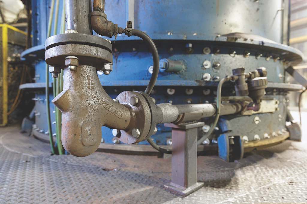 Figure 3: Among several applications, short radius deflection elbows at Waupaca Foundry find use at dead-end stops where materials are diverted downward into silos and bins. Courtesy: Waupaca Foundry