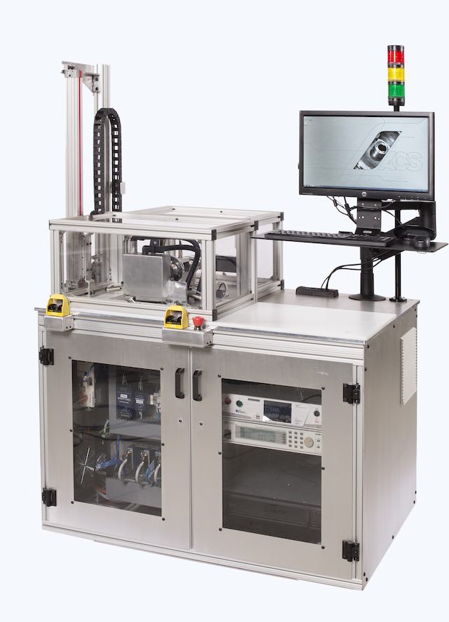 Figure 2: End of line production quality verification test stand. Courtesy: ACS