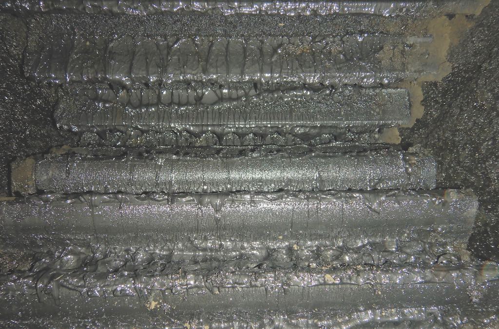 Figure 5: Many open gear customers rely on black greases, which contain molybdenum disulfide or graphite EP additives. Courtesy: Klüber Lubrication/STLE