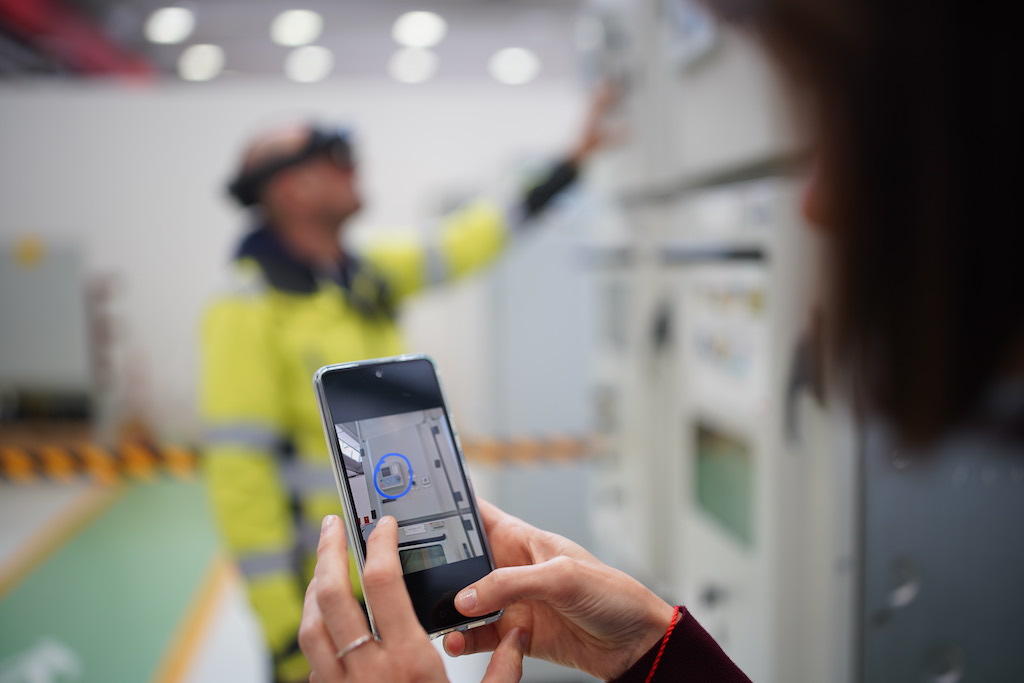 Figure 1: Augmented reality bringing ABB expertise and knowledge when and where you need it with RAISE – a remote service solution that enables ABB experts to guide field operators. Courtesy: ABB