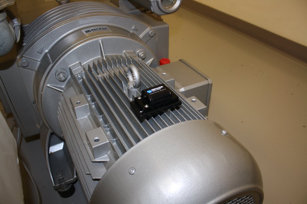 Figure 1: A condition monitoring device magnetically installed on a motor to monitor vibration and temperature. Courtesy: Grace Technologies