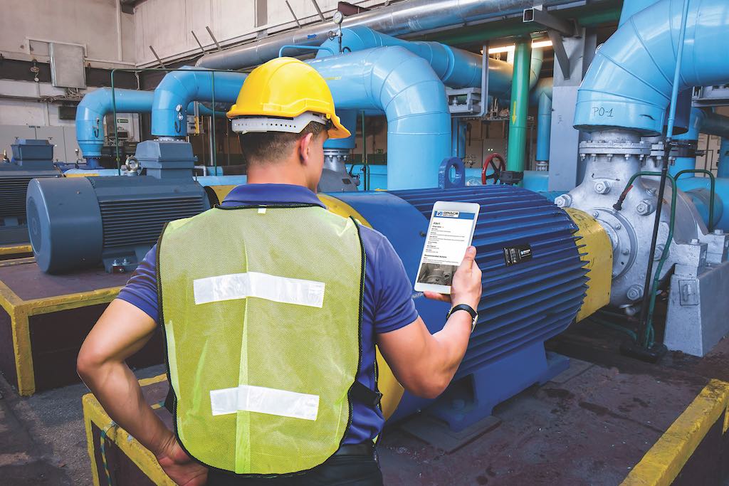 Figure 2: A maintenance technician using a web-based browser to see real-time insights provided by a motor condition monitoring device. Courtesy: Grace Technologies