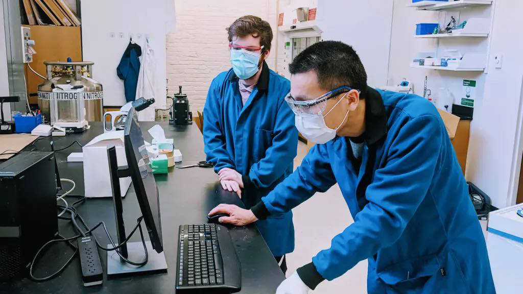 Working with Assistant Professor Dawei Feng, Patrick Sullivan (left) and Xiu Liang Lyu designed and synthesized new organic molecules that could make aqueous organic redox flow batteries a commercially viable way of storing renewable energy for the grid. Courtesy: Flux XII, University of Wisconsin-Madison