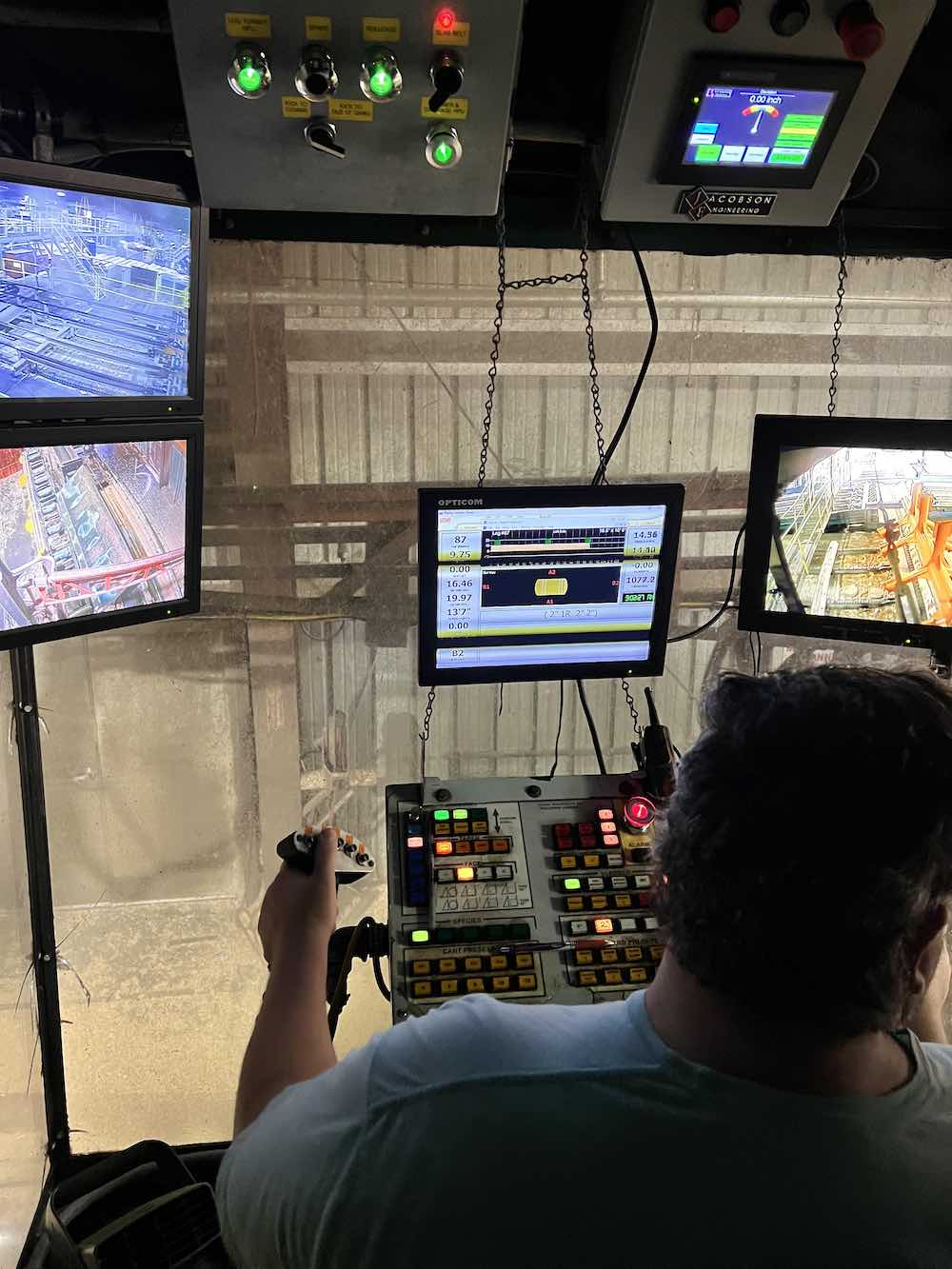 Figure 1: An operator running equipment from the safety of an operator booth with the help of Opticom cameras. Courtesy: Opticom