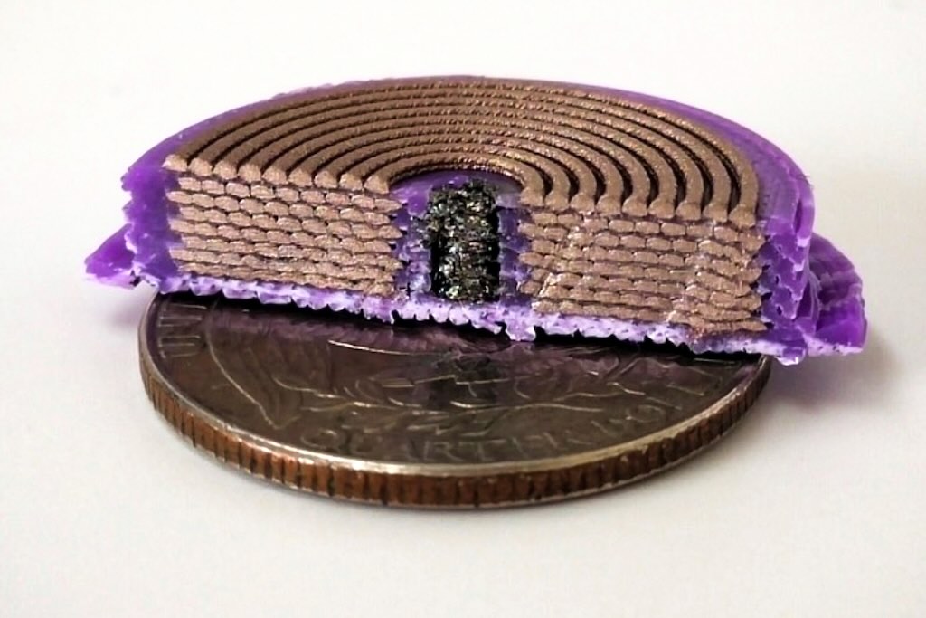 MIT researchers modified a multi-material 3D printer so it could produce three-dimensional solenoids in one step by layering ultrathin coils of three different materials. It prints a U.S. quarter-sized solenoid as a spiral by layering material around the soft magnetic core, with thicker conductive layers separated by thin insulating layers.