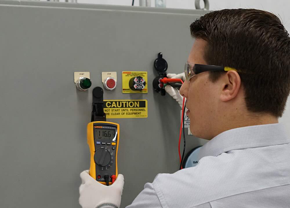 Figure 2: Voltage verification using a handheld testing device through a UL 61010-certified permanent electrical safety device (PESD) test point, ensuring an efficient and compliant procedure. Courtesy: Grace Technologies Inc.