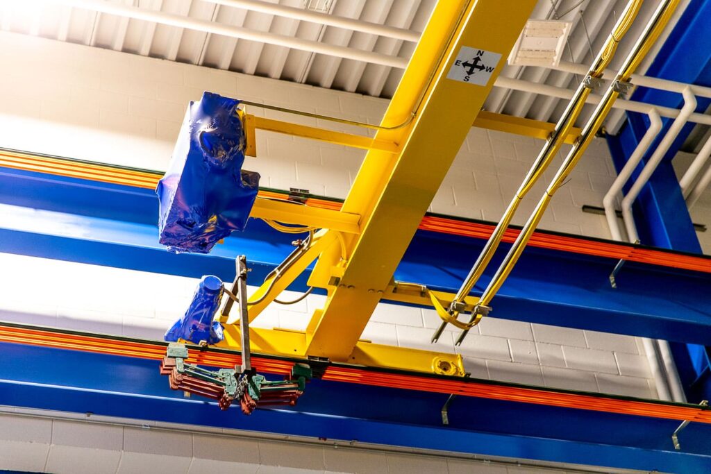 Harnessing the power of artificial intelligence, industrial cranes are transforming the landscape of construction, offering smarter, safer and more reliable operations. Courtesy: American Equipment