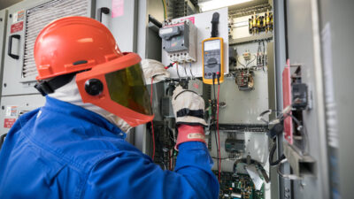 Figure 3: Proper PPE is a must when working on energized equipment. Courtesy: Shermco Industries