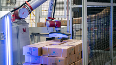 Figure 3: WEMAS Absperrtechnik GmbH replaced a repetitive and unergonomic manual depalletizing task with an off-the-shelfOff-the-shelf robotic palletizing solution powered by OnRobot’s user-friendly D:PLOY-platform. With same-day installation, the solution delivered $31,000 in annual cost savings at WEMAS. Courtesy: OnRobot When Schrobbelèr B.V., producer of an iconic Dutch herbal liquor, was ready to automate its palletizing tasks, the company needed an approach that could seamlessly integrate into existing operations. Like many companies in the beverage industry, Schrobbelèr had determined that manual palletizing posed ergonomic and productivity challenges.
