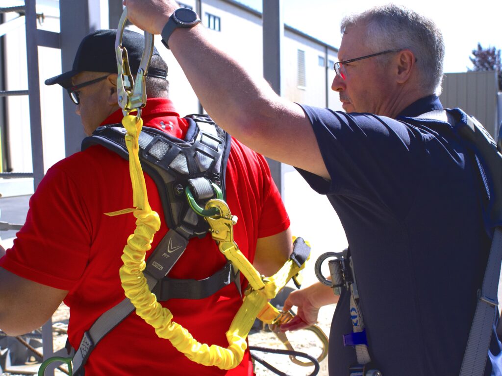 Figure 2: An employee receiving a hands-on demonstration during a fall protection training. Courtesy: Diversified Fall Protection
