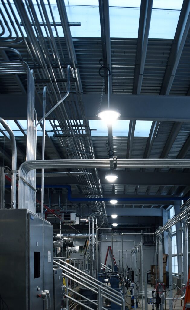 Figure 3: Low-bay LED fixture with plug and cord for ease of maintenance at a wastewater treatment plant. Courtesy: CDM Smith
