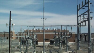 Figure 1: Utility-scale electrical substation infrastructure supporting the safe and reliable distribution of power, where circuit protection systems play a critical role in preventing large scale failures. Courtesy: CDM Smith