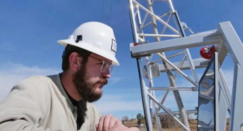 A technician monitors methane at an oil and gas site in Colorado. Courtesy: Colorado University.